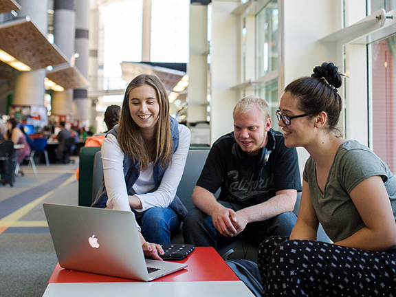 UCOL Palmerston North campus featuring students in The Atrium